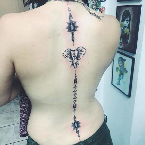 25 Purposeful Spine Tattoo Designs for Women and Girls