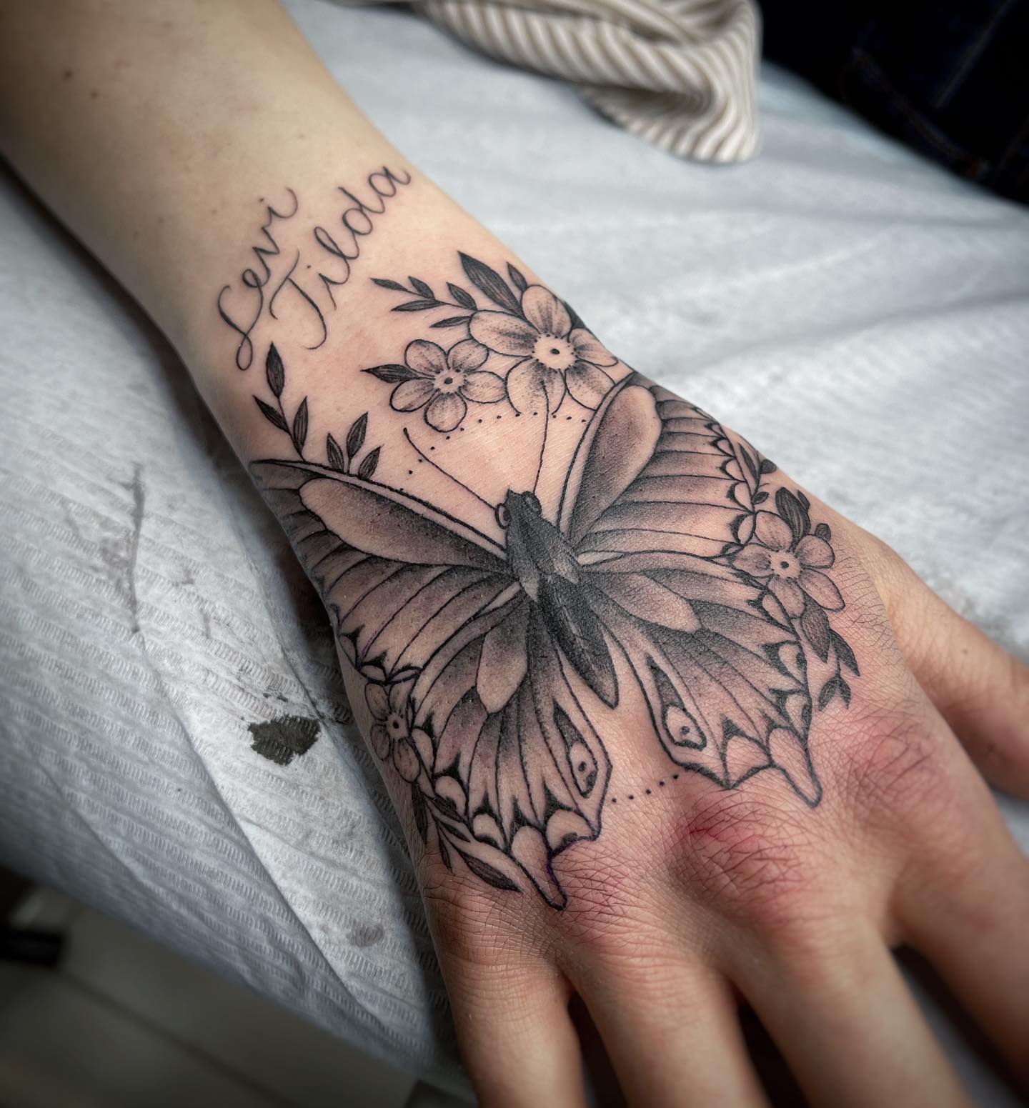 Hand Butterflies Tattoos