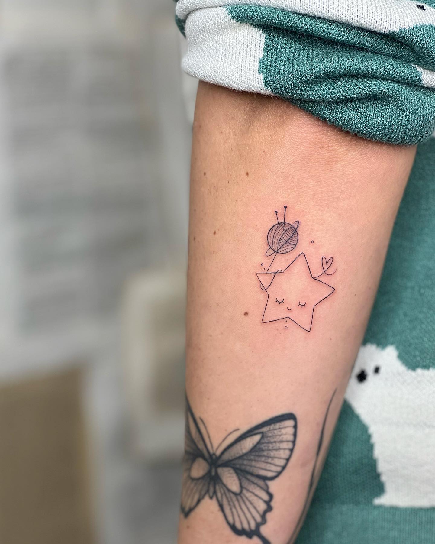 Sisters matching sun moon and star tattoos
